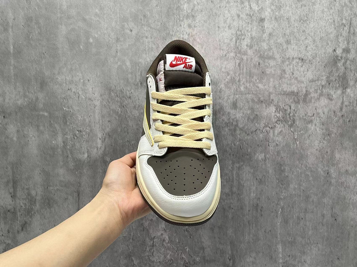 Air Jordan 1 Low White‑Brown Reverse Swoosh Sneakers